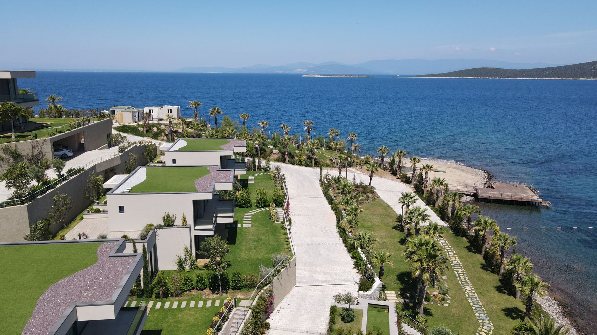 Brand New Seafront Villa Slide Image 1